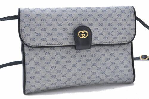Authentic GUCCI Micro GG 2way Shoulder Clutch Bag PVC: Brand: GUCCI Bag Height: 6.3inches (16cm) Material: PVC Bag Depth: 1.2inches (3cm) Style: Shoulder Bag MPN: Does not apply Color: Navy Serial Number: 0040560002 Department: Women Bag Length: 8.9inches