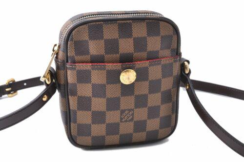 Authentic Louis Vuitton Damier Rift Shoulder Cross Body: Brand: Louis Vuitton Bag Height: 5.9inches (15cm) Material: Damier Canvas Bag Depth: 1.6inches (4cm) Style: Shoulder Bag MPN: Does not apply Color: Brown Serial Number: SR0065 Department: Women Bag Le