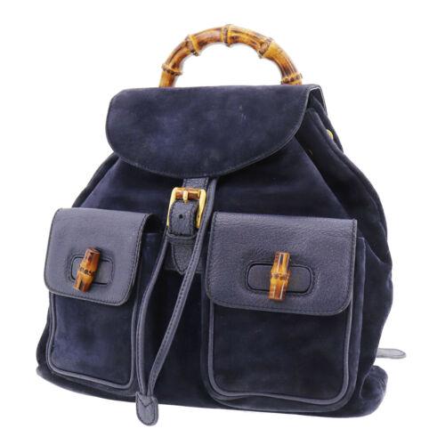 Authentic GUCCI Bamboo Backpack Hand Bag Navy Suede: Size: Medium Closure: Belt Flap Drawstring Country/Region of Manufacture: Italy Brand: Gucci Style: Backpack Style Handle/Strap Material: Bamboo Bag Height: 12.2 Lining Color: Navy Product Line: Gucci