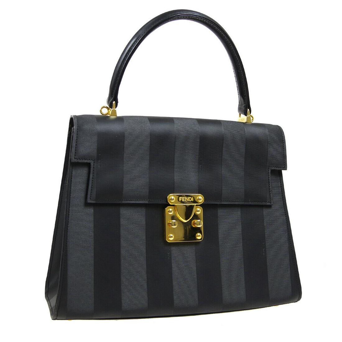 Authentic FENDI Logos 2Way Hand Bag: Brand: FENDI Model: Logos 2Way Hand Bag Country of Origin: Italy Material: Leather Color: Black Size (Inch): W 11.8 x H 9.1 x D 4.3 " Handle Drop. 4.7 " Strap Drop. 24.0 " Size (CM): W 30.0 x H 23.0 x