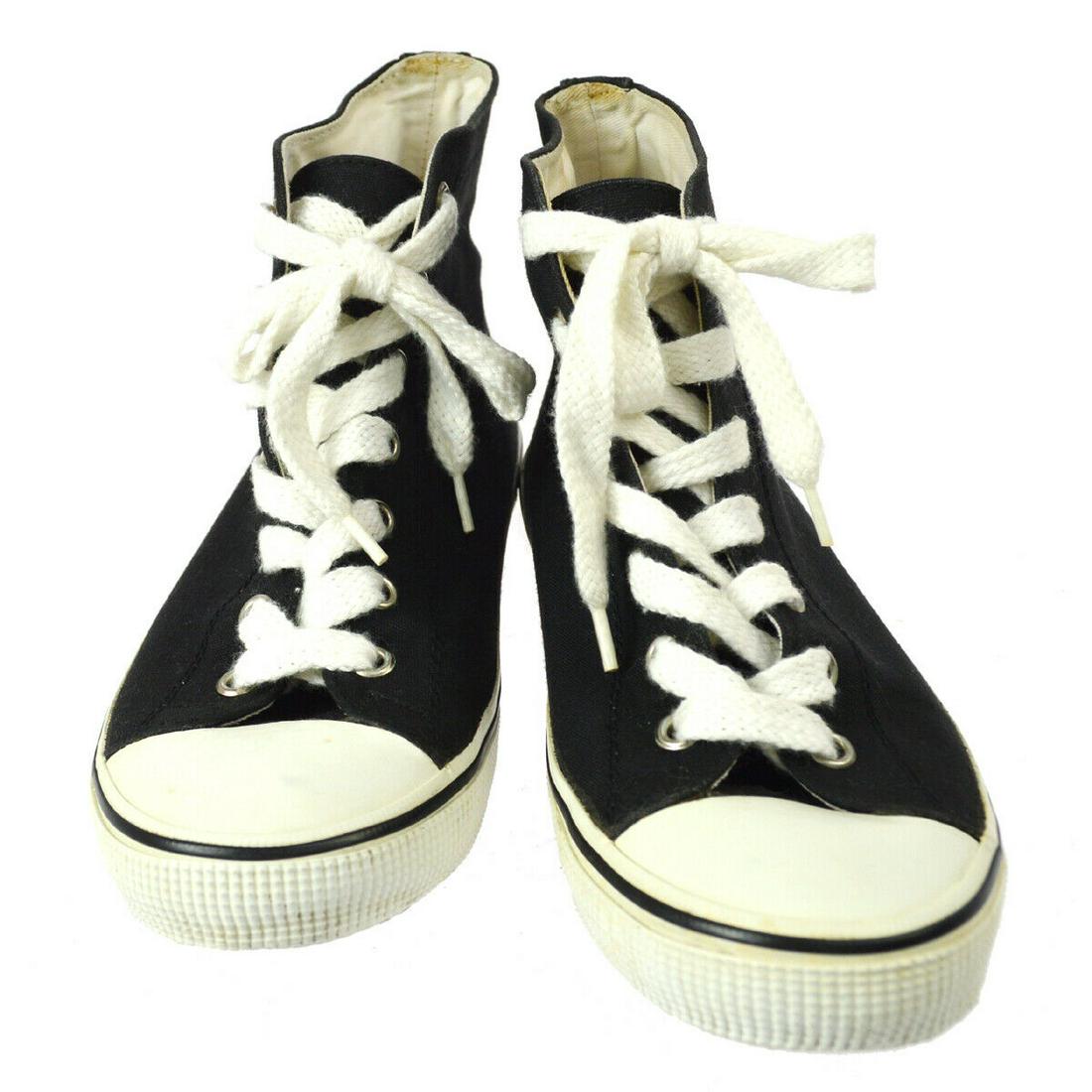 Authentic CHANEL Sneakers: Brand: CHANEL Model: Sneakers Country of Origin: Italy Material: Canvas Color: White Black Size (Inch): (Inch):Notation Size . 35 = 8.9 "Out Sole : W 3.1 Ã— H 9.1 "Heel : 0.8 " Size (CM): All Bidha