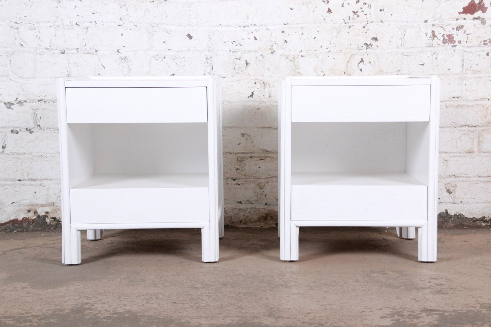 McGuire Hollywood Regency White Lacquered Rattan: A gorgeous pair of mid-century modern Hollywood Regency nightstands or end tables By McGuire of San Francisco USA 1960s Combed oak + rattan + lacquer Measures: 19.5"W x 18.25"D x 23"H. Newly refinishe