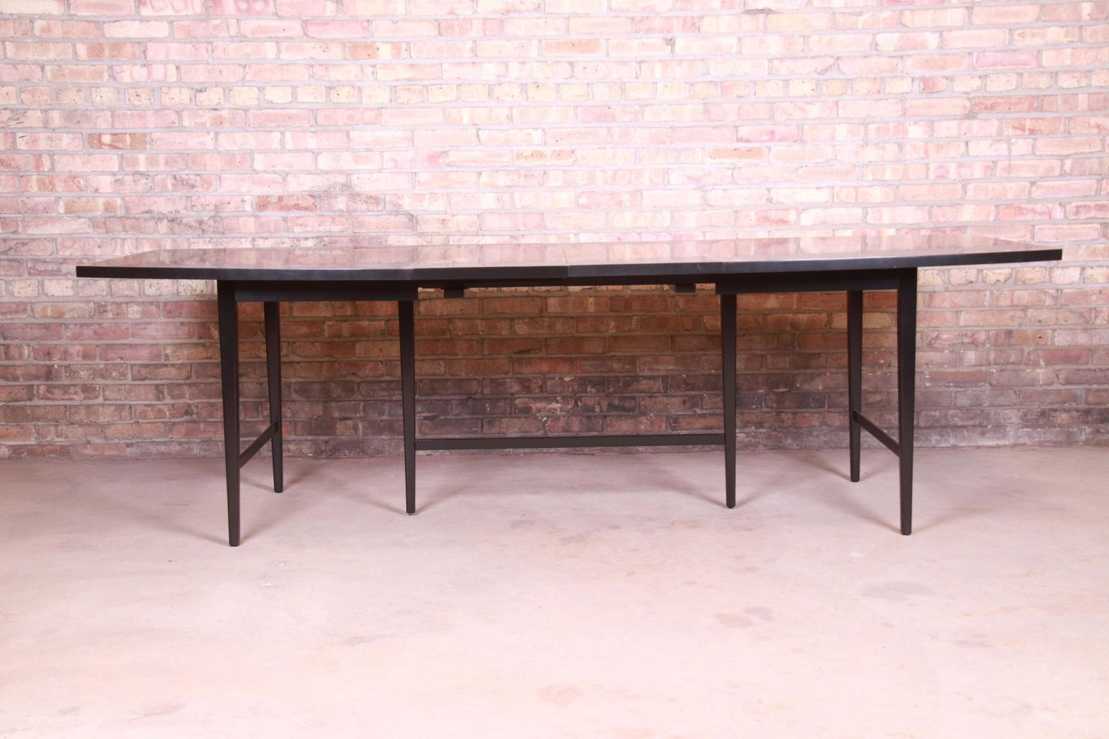 Paul McCobb Planner Group Mid-Century Modern Black: An exceptional mid-century modern boat-shaped extension dining table By Paul McCobb for Winchendon Furniture "Planner Group" USA 1950s Solid maple with black lacquered finish. Measures: 66.13"W x 36.7