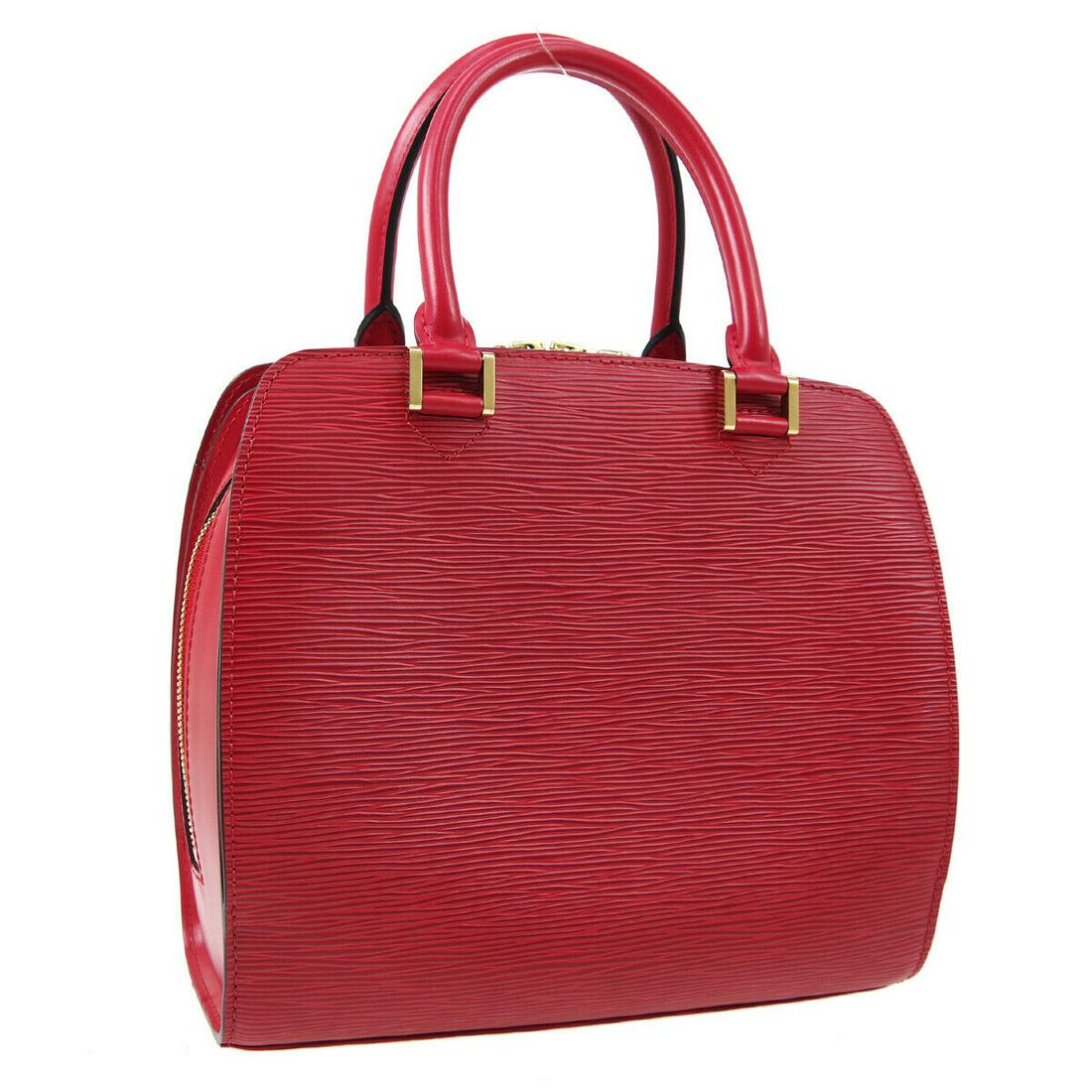 Authentic LOUIS VUITTON Pont Neuf Hand Bag: Brand: LOUIS VUITTON Model: Pont Neuf Hand Bag Country of Origin: France Material: Alcantara Color: Red Size (Inch): W 9.8 x H 8.7 x D 4.3 "Handle Drop. 3.9 " Size (CM): W 25.0 x H 22.0 x D 11.0 cmHan