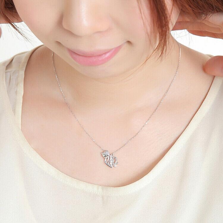 Authentic Sanrio necklace Hello Kitty x Yumi Katsura: Condition: New chain length is 45cm ( Free adjuster type with adjustable length) charm size is 1.7cm x1.1cm Materials : SILVER925 Silver color Rhodium plating Pink gold color Pink gold plating Stone .