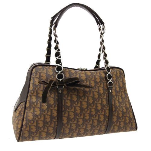Authentic Christian Dior Trotter Romantic Hand Bag: Size: Medium MPN: Does not apply Model: Dior Romantic Closure: Zip Country/Region of Manufacture: Italy Occasion: Casual Department: Women Brand: Christian Dior Style: Hand Bag Bag Depth: 6.2 Bag Heig