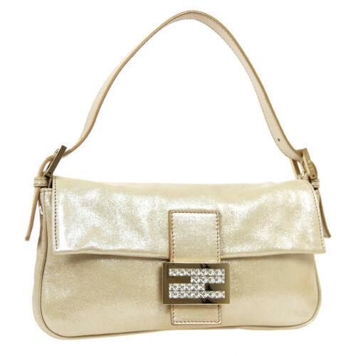 Authentic FENDI Baguette Stone Hand Bag Metallic Beige: Size: Medium Features: Adjustable Strap Inner Pockets Accents: Stoned Logo Color: Metallic Beige Model: Hand Bag MPN: Does Not Apply Country/Region of Manufacture: Italy Closure: Flap Magnet Departmen