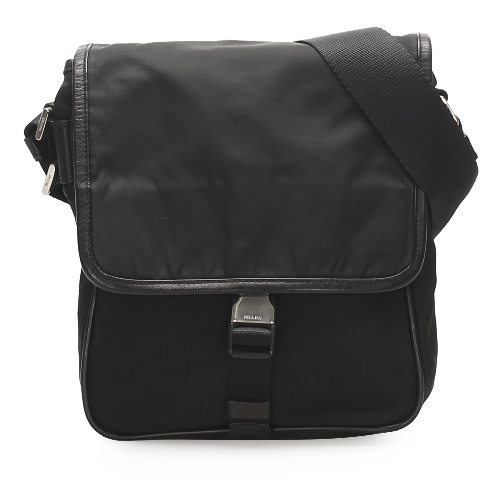 Authentic Prada Tessuto Crossbody Bag: This crossbody bag features a nylon body with leather trim an adjustable flat nylon strap an exterior back slip pocket a front flap with a buckle closure and an interior zip pocket. Brand: Prada Model