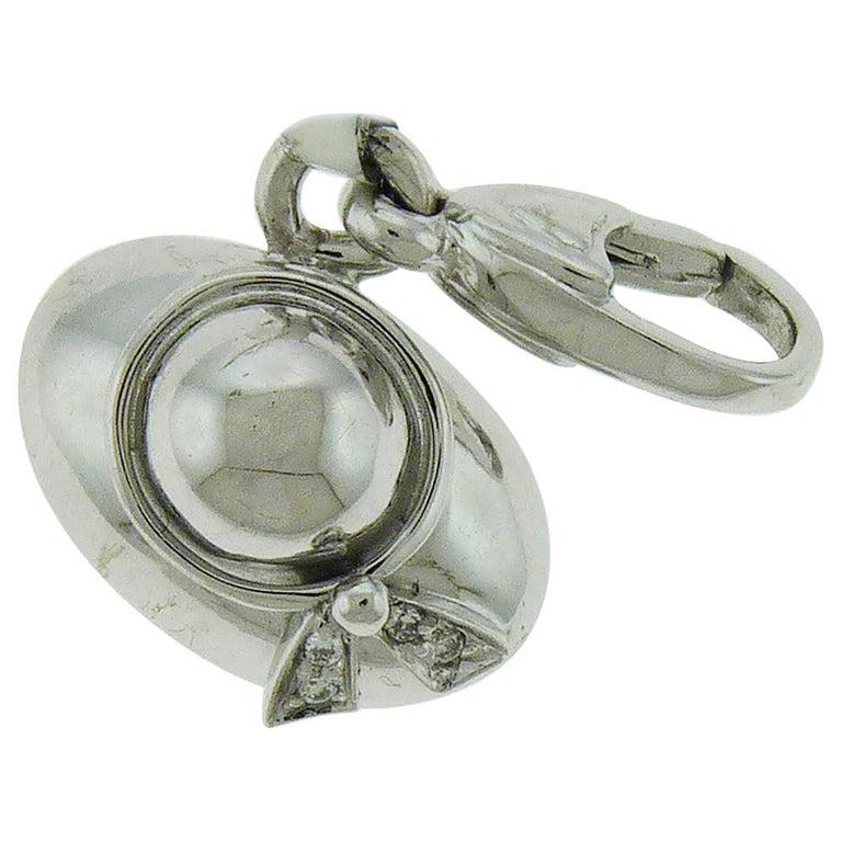 Authentic Diamonds and 18 Karat Gold Charms by Crivelli: A variety of modern charms embellished with diamonds and set in 18K gold. Created by Crivelli in Italy. A hat charm with diamonds and in 18K white gold. Weight of diamonds is 0.02 carats. Weight of th