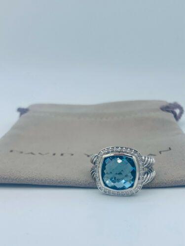 David Yurman Sterling Silver Albion Ring 11mm with Blue: Secondary Stone: Topaz Metal: Sterling Silver Main Stone Color: Blue Brand: David Yurman Gender: Female Ring Size: 8 Lot: No Total Carat Weight (TCW): 0.22 Metal Purity: 925 Main Stone Shape: Cushion 