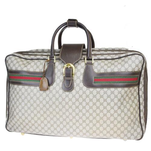 Authentic GUCCI GG Pattern Sherry Travel Hand Bag: Brand: Gucci Size: Extra Large Material: PVCLeather Bag Width: 26.0 Style: Hand Bag Bag Height: 14.6 Color: Brown Bag Depth: 7.5 Department: Unisex All Bidhaus items come with a 100% money-back authen