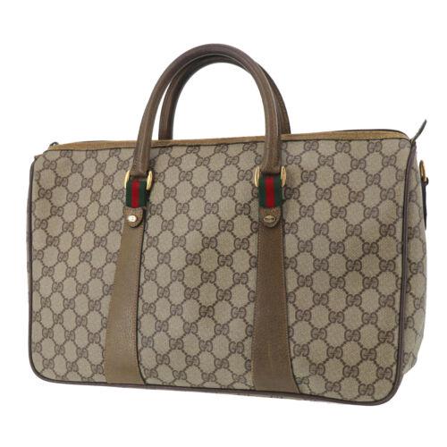 Authentic GUCCI GG Plus Web Stripe Hand Bag Brown PVC: Size: Medium Brand: Gucci Country/Region of Manufacture: Italy Bag Depth: 5.5 Style: Hand Bag Handle/Strap Material: Leather Bag Height: 10.2 Lining Color: Beige Material: PVC Leather Inside Pockets: 