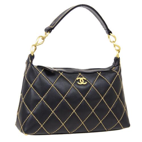 Authentic CHANEL Wild Stitch Quilted CC Chain Hand Bag: Size: Medium Pattern: CHANEL Wild Stitch Character: Stitch Features: Bottom Studs Chain Strap Inner Pockets Accents: Quilted Color: Black Model: Hand Bag MPN: Does not apply Country/Region of Manufact