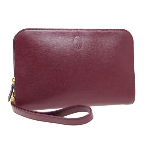Authentic Cartier Must de Cartier Clutch Hand Bag EPEF: Size: Medium Features: Pockets Accents: Logo Color: Bordeaux Model: Clutch Hand Bag MPN: Does not apply Country/Region of Manufacture: Spain Closure: Flap Department: Women Occasion: Casual Style: Clu