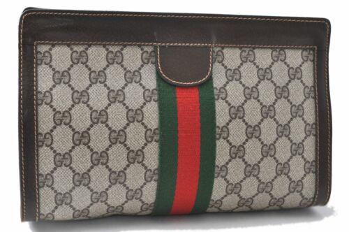 Authentic GUCCI Web Sherry Line Clutch Bag GG PVC: Brand: GUCCI Type: Clutch Bag Country/Region of Manufacture: Italy Department: Women Bag Length: 10.8inches(27.5cm) Material: PVC Bag Height: 6.7inches(17cm) Color: Brown Bag Depth: 3.3inches(8.5cm) M