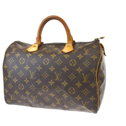 Authentic LOUIS VUITTON Speedy 30 Travel Hand Bag: Brand: Louis Vuitton Occasion: Casual Size: Medium Model: Speedy 30 Color: Brown MPN: M41526 Department: Women Hardware Material: Gold-Plated Style: Hand Bag Handle Style: Double Handles Material: Mon