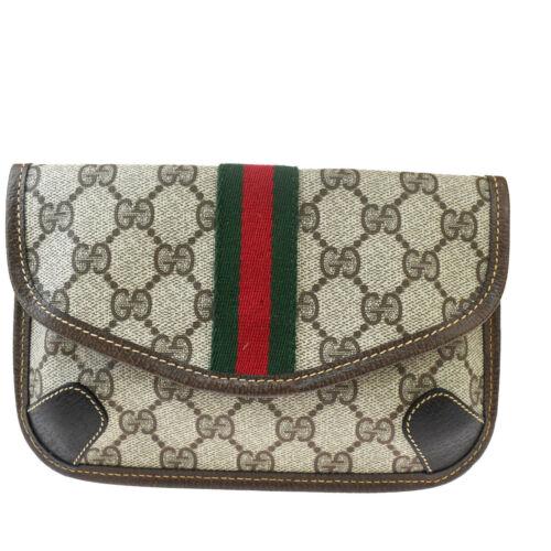 Authentic GUCCI GG Pattern Shelly Mini Clutch Bag Pouch: Brand: Gucci Lining Material: Canvas Size: Small Occasion: Casual Color: Brown Country/Region of Manufacture: Italy Department: Women Hardware Material: Gold-Plated Style: Clutch hand BagPouch Bag Wid