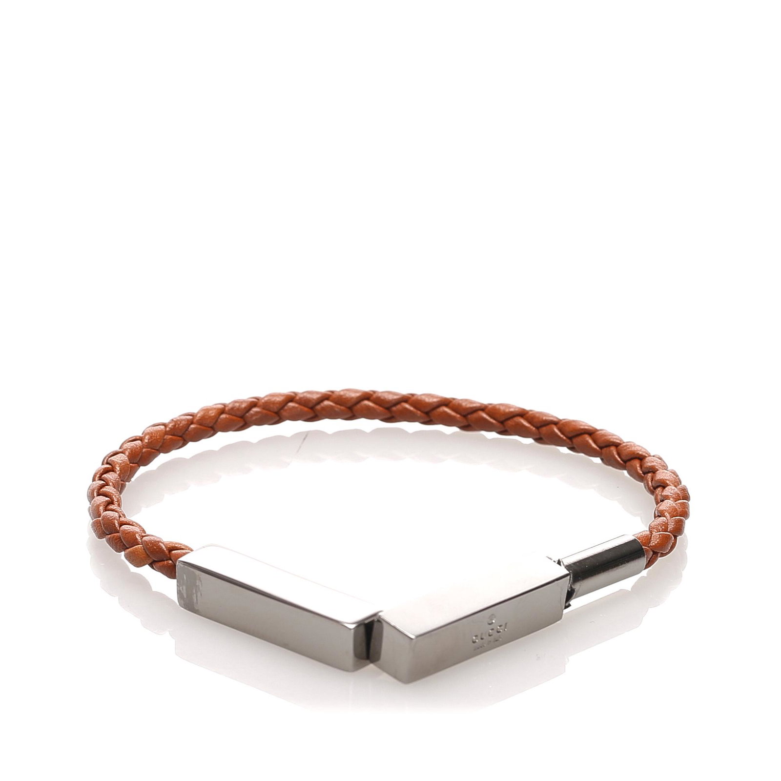 Authentic Gucci Woven Leather Bracelet: This bracelet features a woven leather wrist strap and a magnetic closure. Brand: Gucci Model: Woven Leather Bracelet Origin: Italy Category: Costume Color: Brown Style: Others Material: Leather Condi