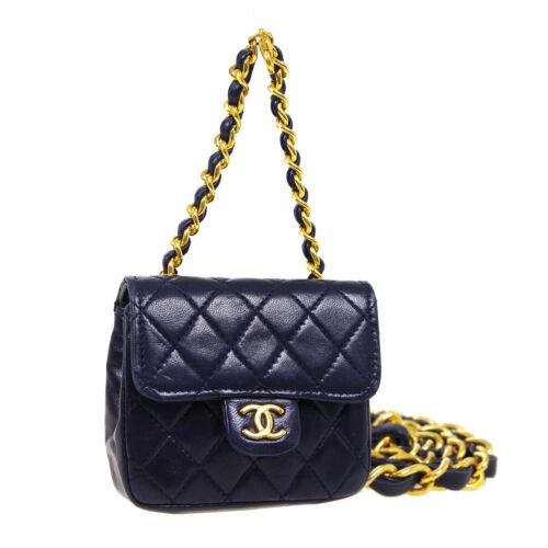 Authentic CHANEL Classic Flap Micro Bum Belt Bag Purse: Size: Mini Features: Detachable Belt Charm Chain Strap Outer Pockets Accents: Quilted Color: Navy Model: Bum Bag MPN: Does Not Apply Country/Region of Manufacture: France Closure: Pushlock Flap Style: