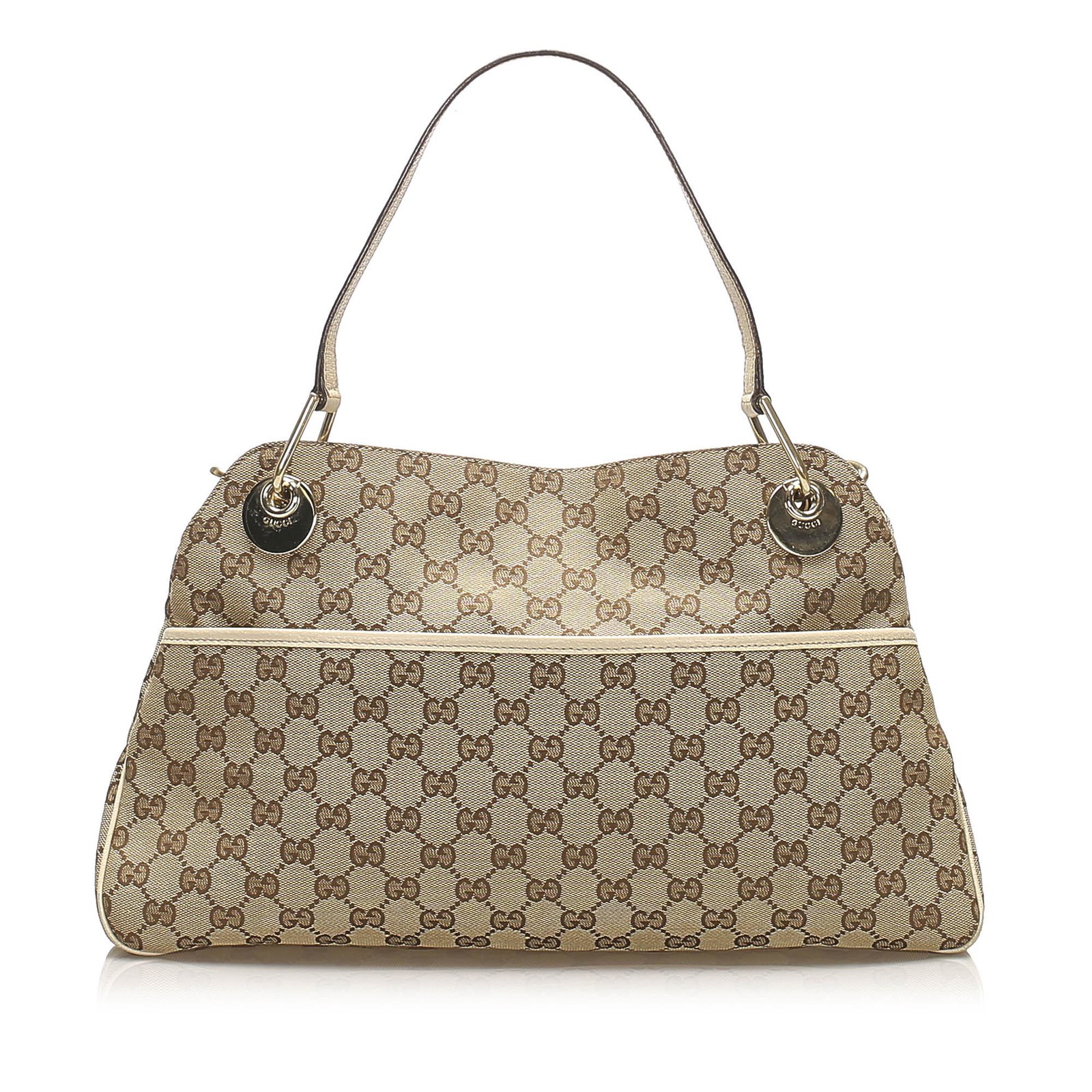 Authentic Gucci GG Canvas Eclipse Shoulder Bag: The Eclipse shoulder bag features a canvas body with leather trim a front exterior slip pocket leather flat straps an open top with a magnetic closure and an interior zip and slip pockets. Brand: Gucc
