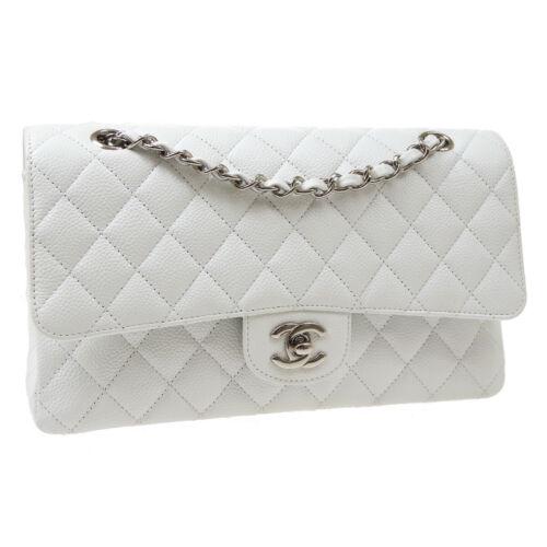 Authentic CHANEL Classic Double Flap Medium Shoulder: Size: Medium Pattern: Matelasse Accents: Quilted Features: Adjustable Strap Chain Strap Pockets Model: Classic Double Flap Medium Color: White Country/Region of Manufacture: France MPN: Does not apply