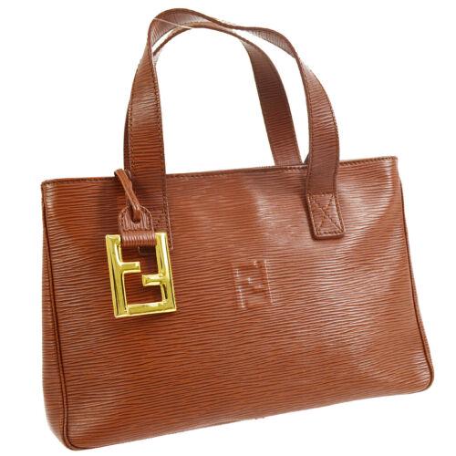 Authentic FENDI Logos 2way Hand Bag Purse Brown Leather: Size: Medium Features: Bag Charm Inner Pockets Model: FENDI Hand Bag Color: Brown Country/Region of Manufacture: Italy MPN: Does Not Apply Style: Hand Bag Occasion: Casual Handle Style: Double Handles