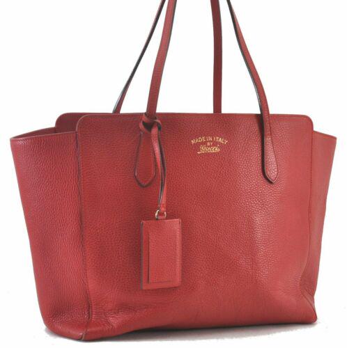 Authentic GUCCI Leather Swing Tote Bag Red: Brand: GUCCI Style: Tote Bag Country/Region of Manufacture: Italy Type: Tote Bag Serial Number: 354397204991 Department: Women Bag Length: 13.2inches (33.5cm) Material: Leather Bag Height: 11.4inches 