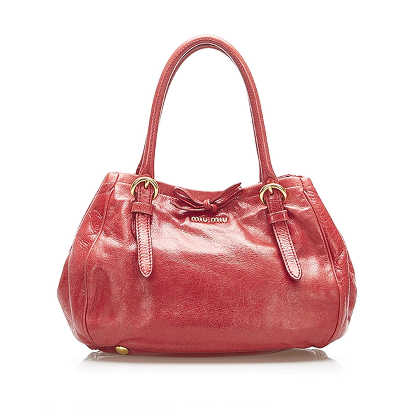 Authentic Miu Miu Vitello Lux Handbag: The Vitello Lux handbag features a calfskin leather body rolled leather handles an open top with a magnetic snap button closure and interior zip and slip pockets. Brand: Miu Miu Model: Vitello Lux Han