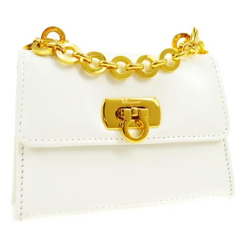 Authentic Salvatore Ferragamo Gancini Mini Shoulder Bag: Size: Mini Color: White Model: Shoulder Bag Closure: Buckle Country/Region of Manufacture: Italy Occasion: Casual Department: Women Brand: Salvatore Ferragamo Style: Shoulder Bag Bag Depth: 1.2 Bag He