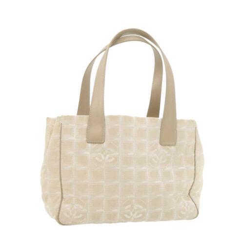 Authentic CHANEL Travel Line Tote Bag Beige CC Nylon: Brand: CHANEL Size: W30 x H22 x D13cm(Approx) Color: Beige Country/Region of Manufacture: Italy Material: Nylon Type: unknown Style: Tote Bag Department: Woman UPC: Does not apply EAN: Does not apply 