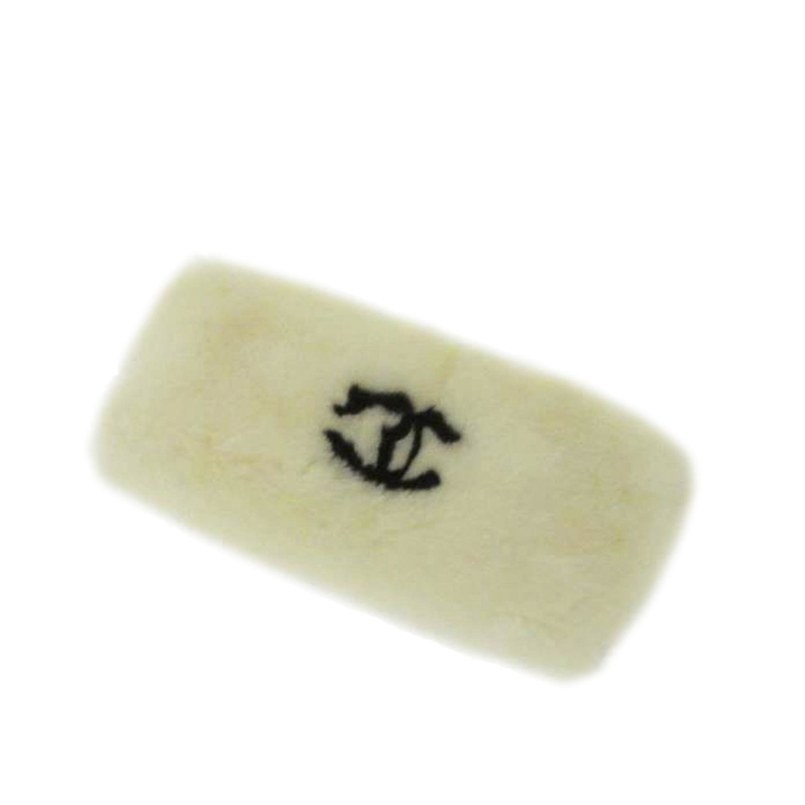Authentic Chanel CC Fur Bracelet: This bracelet features a rabbit fur body and snap button closures. Brand: Chanel Model: CC Fur Bracelet Origin: France Category: Costume Color: White Style: CC Material: Natural Material Condition: B+