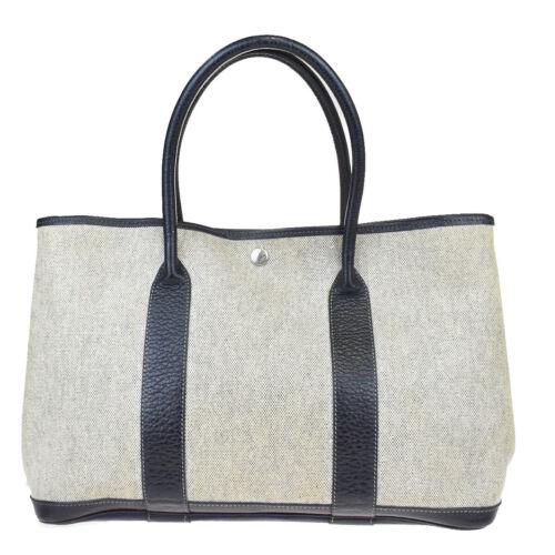 Authentic HERMES Garden Party Hand Tote Bag Coating: Brand: HRMES Size: Medium Material: Coating Canvas Leather Bag Width: 14.6 Style: Hand Bag Bag Height: 9.8 Color: Brown Beige Bag Depth: 7.1 Department: Women All Bidhaus items come with a 100% money-