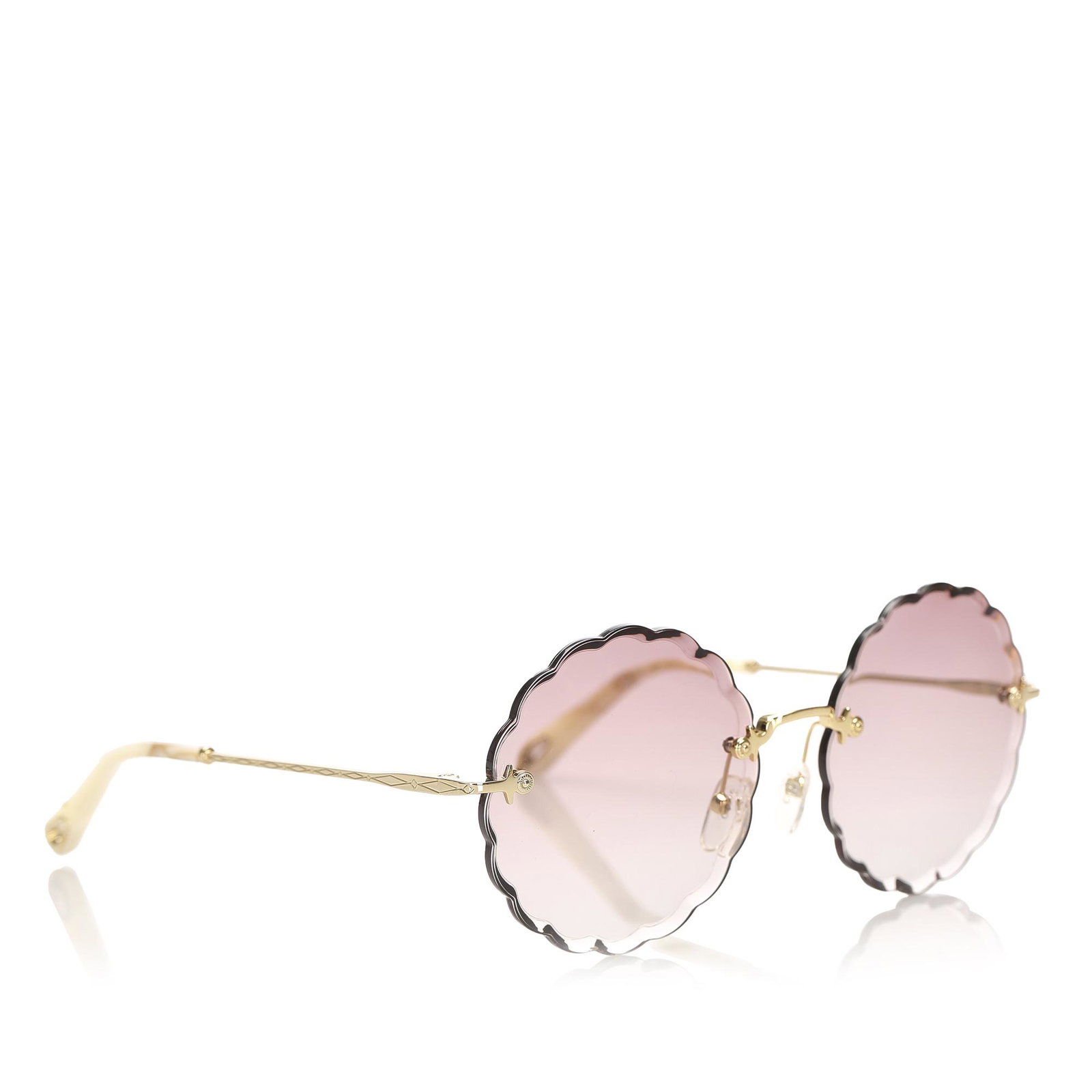Authentic Chloe Round Tinted Sunglasses: These sunglasses feature an acetate body with tinted lenses. Brand: Chloe Model: Round Tinted Sunglasses Origin: France Category: Accessories Color: Brown Style: Others Material: Plastic Condition: B+