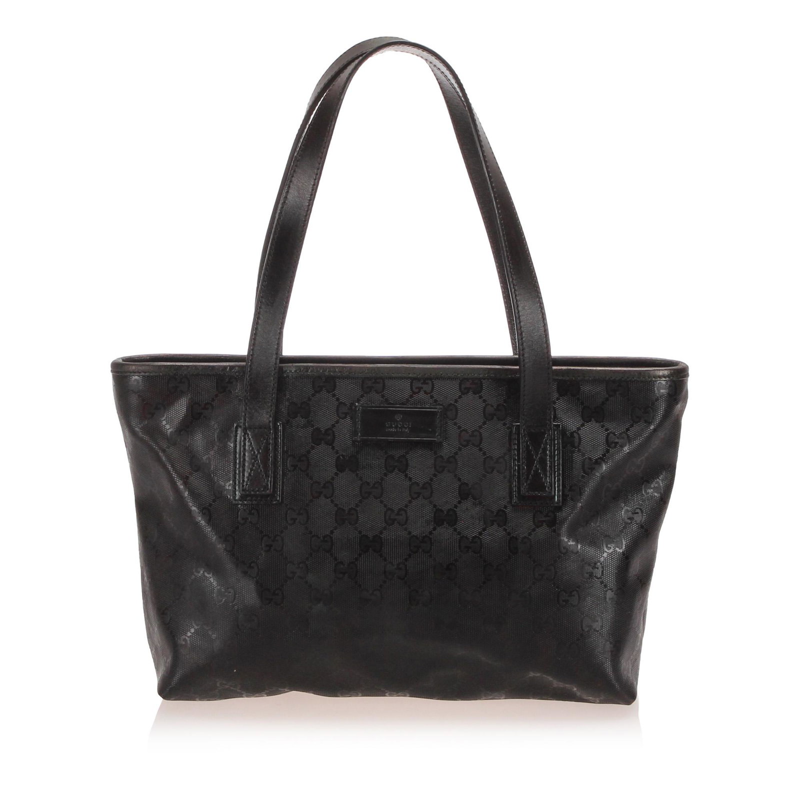 Authentic Gucci GG Imprime Tote Bag: This tote bag features PVC body with leather trim flat leather handles a top zip closure and interior zip and slip pockets. Brand: Gucci Model: GG Imprime Tote Bag Origin: Italy Category: Bags Color: 