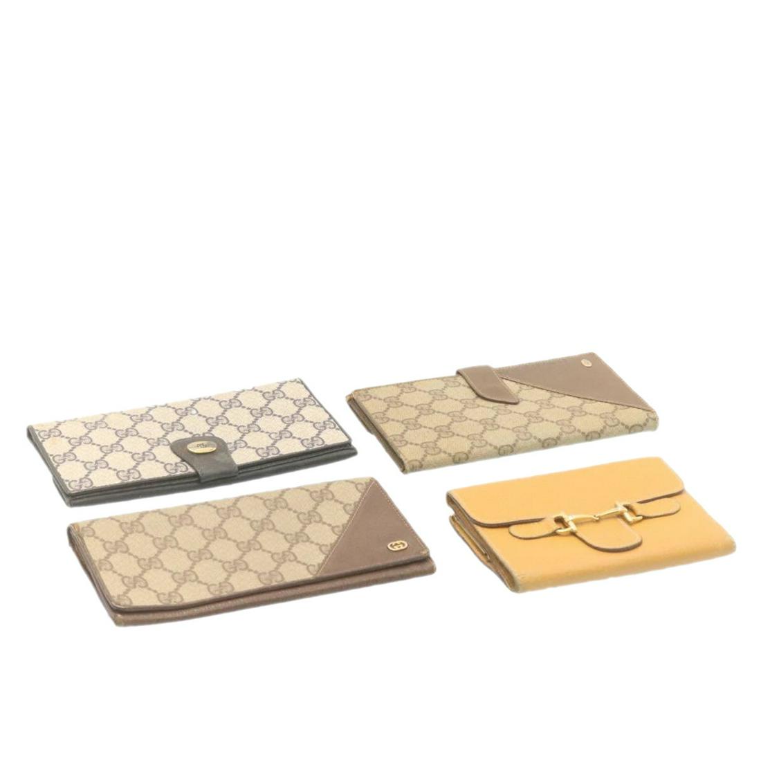 Authentic GUCCI GG Canvas Long Wallet 4set PVC Leather: Brand: GUCCI Style: Wallet Material: Canvas / Leather / PVC Leather Color: Beige / Navy / Brown Made In: Italy Size (Inches): - Exterior Condition: Canvas : lose shape stain crack rubbing dirt lose co