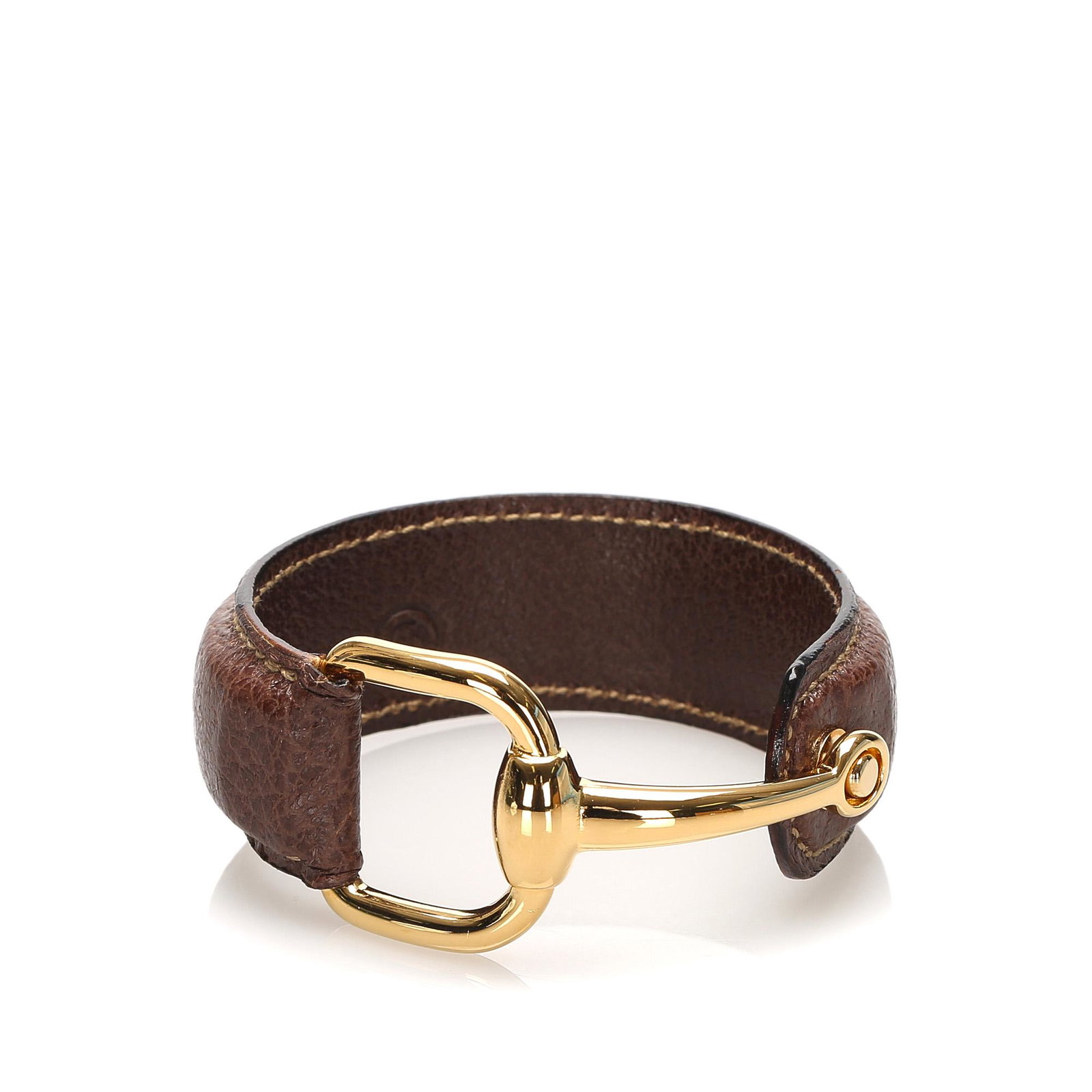 Authentic Gucci Horsebit Leather Bracelet: This horsebit bracelet features a leather wrist strap and gold toned hardware. Brand: Gucci Model: Horsebit Leather Bracelet Origin: Italy Category: Costume Color: Black Style: Horsebit Material: Leat