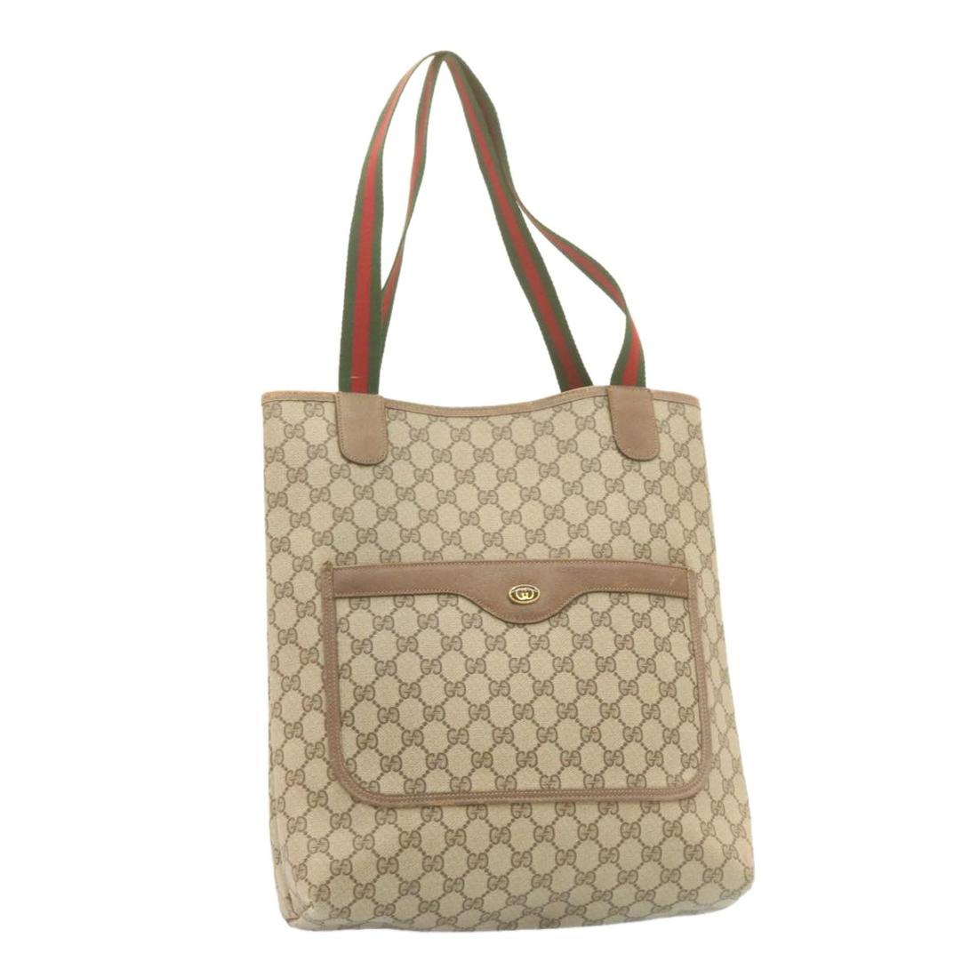 Authentic GUCCI Web Sherry Line GG Canvas Tote Bag: Brand: GUCCI Style: Tote Bag Material: PVC Leather Color: Beige Made In: Italy Size (Inches): W11.81 x H14.17 x D3.54inch / Shoulder Drop 10.23inch(Approx) Exterior Condition: Canvas : rubbing partly 