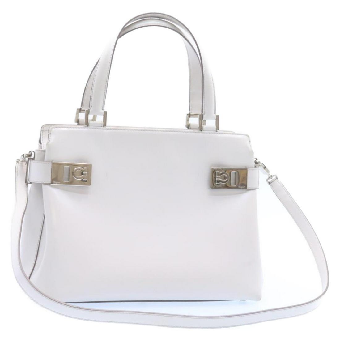 Authentic Salvatore Ferragamo Gancini 2Way Hand Bag: Brand: SALVATORE FERRAGAMO Style: Hand Bag Material: Leather Color: White Made In: Italy Size (Inches): W10.62 x H7.87 x D4.72inch / Shoulder Drop 0-14.17inch(Approx) Exterior Condition: Leather : rub