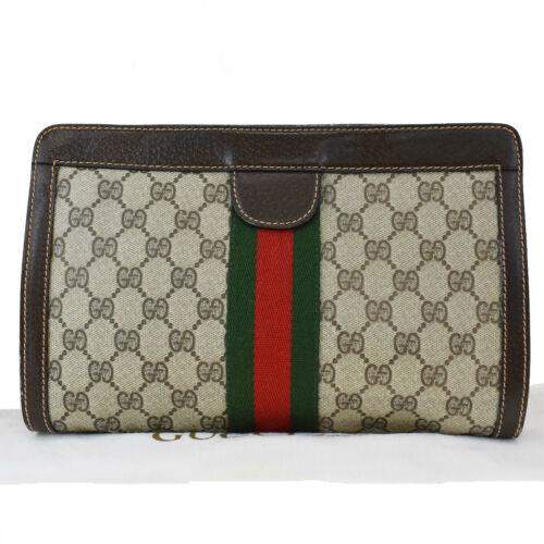 Authentic GUCCI PARFUMS GG Pattern Shelly Clutch Bag: Size: Medium Color: Brown Country/Region of Manufacture: Italy Occasion: Casual Department: Women Brand: Gucci Style: Clutch hand Bag Bag Depth: 3.1 Bag Height: 6.7 Bag Width: 10.6 Product Line: Sherr