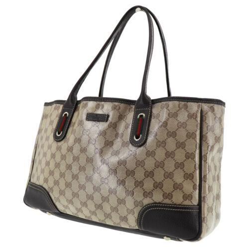 Authentic GUCCI Crystal GG Web Stripe Hand Bag Brown: Inside Pockets: 2 Material: Vinyl Lather Department: Women Hardware Color: Gold Strap Drop: 7.8 Handle/Strap Material: Leather Pattern: Web Striped Bag Width: 14.5 Lining Color: Brown Bag Depth: 3.9 L