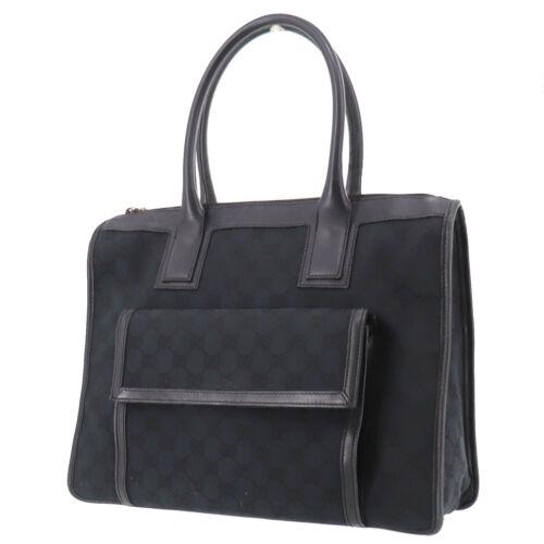 Authentic GUCCI Original GG Tote Hand Bag Black Canvas: Inside Pockets: 1 Country/Region of Manufacture: Italy Department: Women Material: Canvas Leather Strap Drop: 3.9 Hardware Color: Gold Pattern: Original GG Handle/Strap Material: Leather Lining Color: