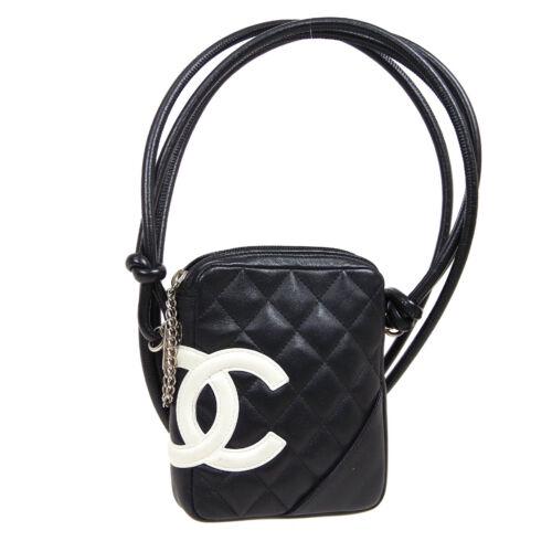 Authentic CHANEL Cambon Line Quilted CC Cross Body Bag: Size: Medium Features: Cross-Body Strap Pockets Accents: Logo Quilted Color: Black White Model: Shoulder Bag MPN: Does Not Apply Country/Region of Manufacture: Italy Closure: Zipper Style: Crossbody O