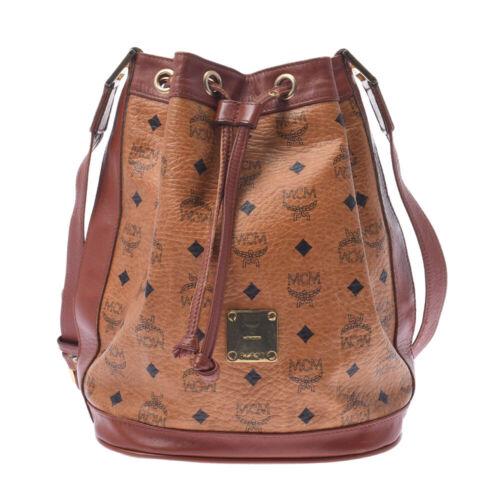 Authentic MCM Drawstring bag Camel bags: Brand: MCM Bag Depth: 16cm Style: bags Bag Length: 36cm Material: Calfskin Department: unisex Color: Brown Type: One Shoulder Bag Size: See Description Format: FixedPrice Bag Height: 29cm UPC: Does no