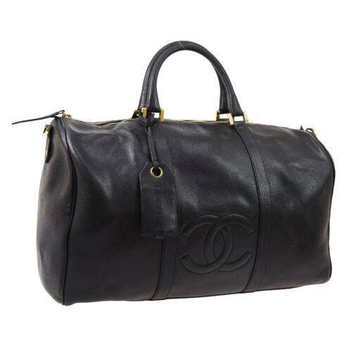 Authentic CHANEL CC Logos 2way Travel Hand Bag Black: Size: Extra Large Pattern: CC Model: Travel Hand Bag Features: Adjustable Strap Bag Charm Bottom Studs Inner Pockets Accents: Logo Color: Black Country/Region of Manufacture: France Closure: Zipper St