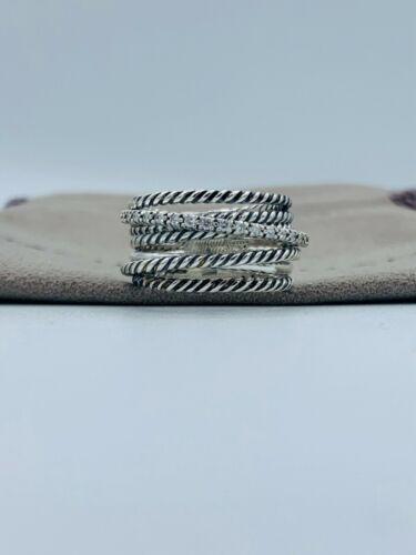 David Yurman Sterling Silver Diamond Crossover Cable: This item qualifies for FREE DOMESTIC SHIPPING to customers in the USA Style: Band Lot: No Secondary Stone: Diamond Gender: Female Ring Shape: Crossover Metal: Sterling Silver Jewelry Type: Ring Brand