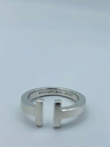 Tiffany & Co Sterling Silver 925 T Square Ring Band Sz: This item qualifies for FREE DOMESTIC SHIPPING to customers in the USA Style: Band Metal Purity: 925 parts per 1000 Main Stone: No Stone Metal: Sterling Silver Gender: Female Brand: Tiffany & Co. Lot: