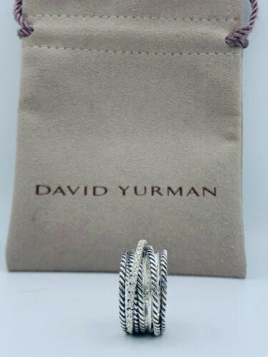 David Yurman Sterling Silver Diamond Crossover Cable: This item qualifies for FREE DOMESTIC SHIPPING to customers in the USA Style: Band Lot: No Secondary Stone: Diamond Gender: Female Ring Shape: Crossover Metal: Sterling Silver Jewelry Type: Ring Brand