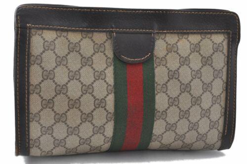 Authentic GUCCI Web Sherry Line Clutch Bag GG PVC: Brand: GUCCI Type: Clutch Bag Country/Region of Manufacture: ****** Department: Women Bag Length: 10.8inches(27.5cm) Material: PVC Bag Height: 6.9inches(17.5cm) Color: Brown Bag Depth: 3.1inches(8cm) 