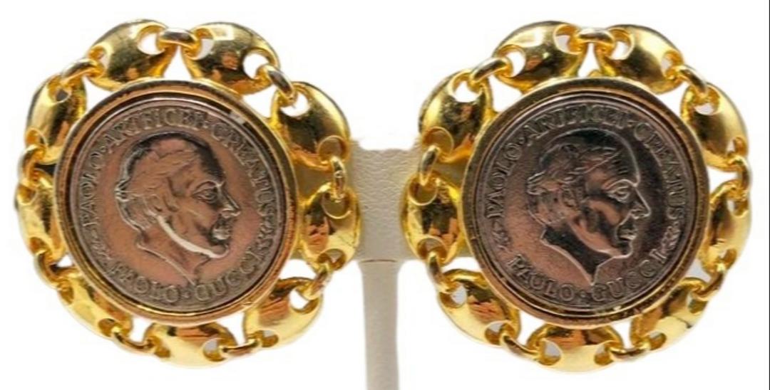 Authentic 21 Paolo Gucci Two Tone Coin Earrings With: This item qualifies for FREE DOMESTIC SHIPPING to customers in the USA Brand: Paolo Gucci Style: Button Hallmark:: Yes Fastening: Clip On Category: Earrings Materials: Costume Metal Size: Other Remark