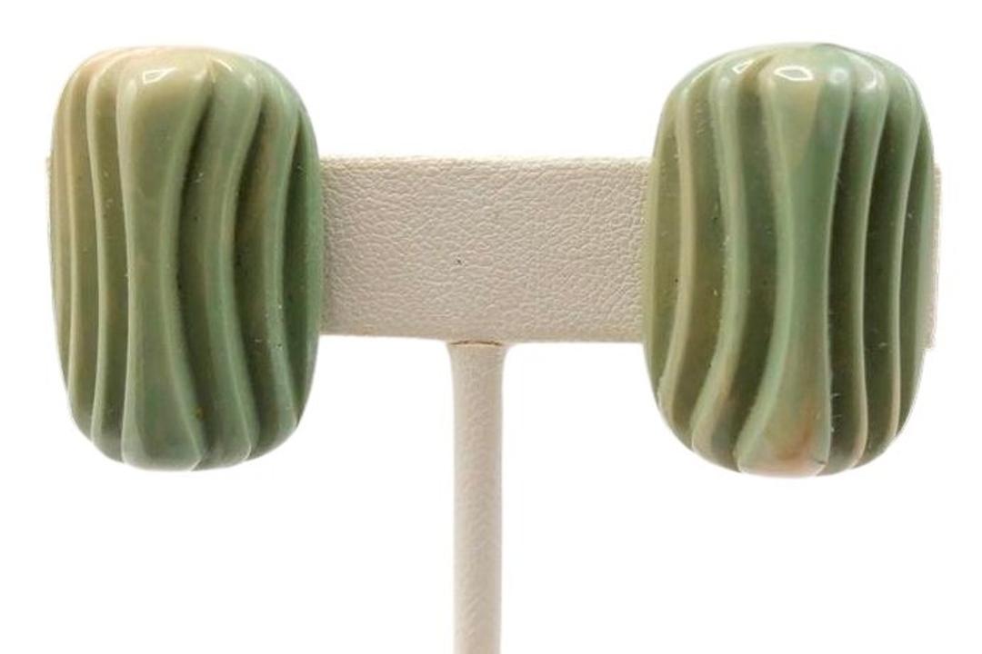Authentic Givenchy Molded Green Resin Earrings: This item qualifies for FREE DOMESTIC SHIPPING to customers in the USA Brand: Givenchy Style: Button Hallmark:: Yes Fastening: Clip On Category: Earrings Materials: Resin, Costume Metal Size: Other Re